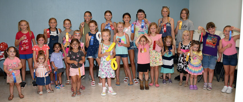 These smiling faces won first, second or third place ribbons in this year&rsquo;s Old Settlers pigtail, ponytail and braid competition. It was held Sunday, Aug. 6, as part of the Country Fair at St. Paul&rsquo;s Lutheran Church.