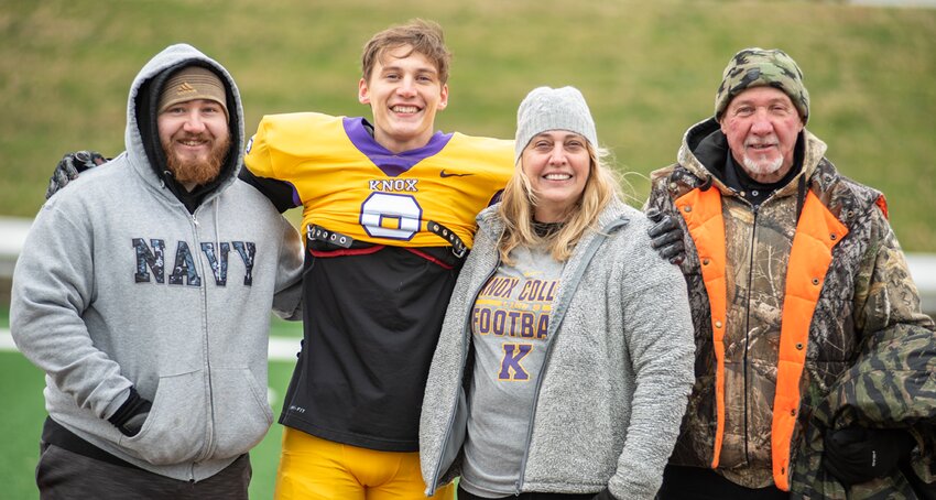 Trevor Geggie, pictured with brother Takoma, mom Dana Geggie and grandfather Wayne Fenton, was smaller in stature but big in heart for Knox College, where he lettered in football and track four times in each sport.