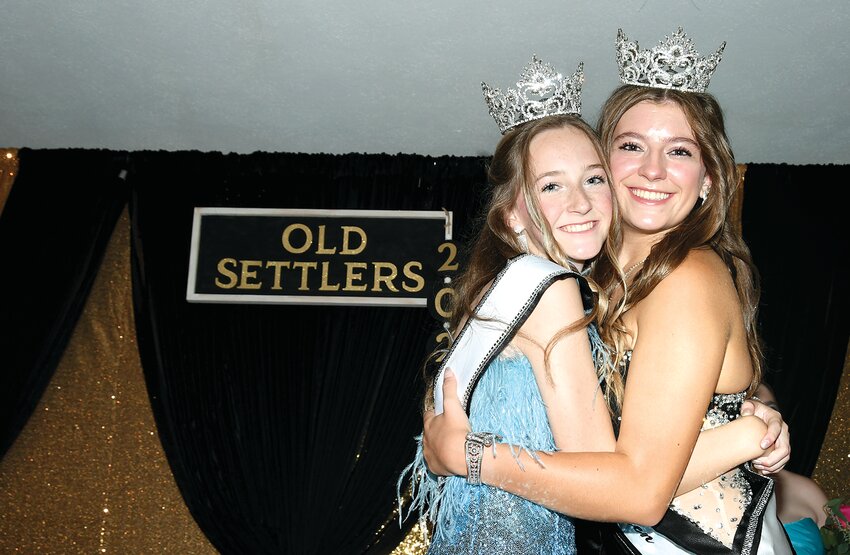 Hillsboro High School sophomore Jenna Durbin was crowned 2023 Old Settlers Queen on Wednesday evening, Aug. 9, at The Lodge on Main in downtown Hillsboro. Due to inclement weather, the annual queen's parade was cancelled and the coronation was moved inside. Pictured above, newly crowned Old Settlers Queen Jenna Durbin, at left, gets a hug from her cousin and retiring 2022 Old Settlers Queen Marah Huber. Durbin is the first Old Settlers Queen to also have served the community as Little Miss Old Settlers and Junior Miss Old Settlers.