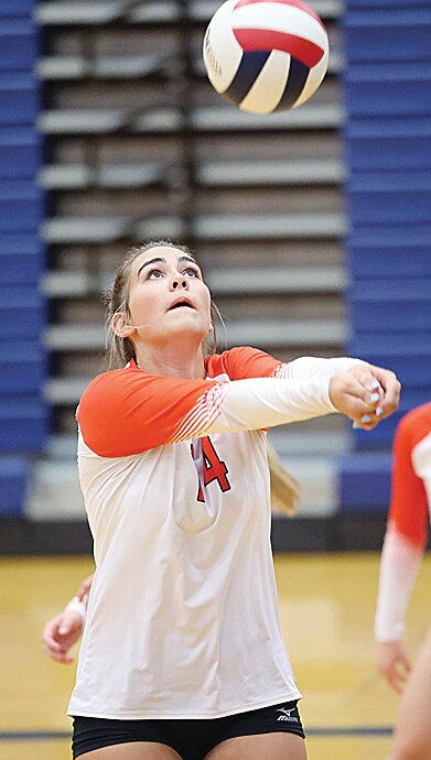 One of the few returnees with varsity experience, Hillsboro's Addison Lowe had six kills, including a game winner as the Toppers defeated Pana in two games on Tuesday, Aug. 22, on the Panthers' home court.