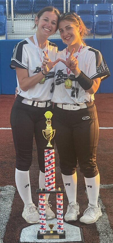 Ella Greenwood (left) and Anika Camp (right) had plenty of opportunities to flash the &ldquo;W&rdquo; during their summer season with the 16U Lady Roughnecks as the team went 27-9 with four tournament wins.