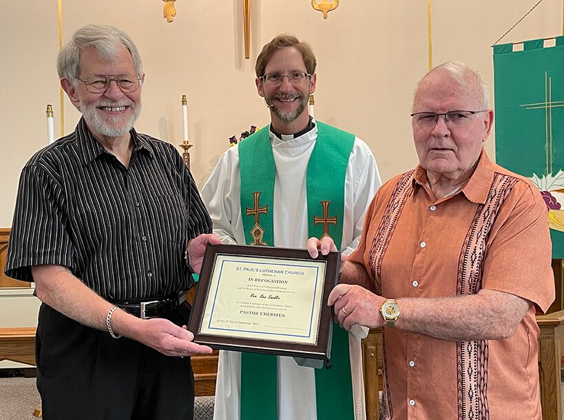 From the left are St. Paul&rsquo;s Lutheran Pastor Emeritus Ken Sandlin, Pastor Stefan Munker and Vice-President Charles Moody.