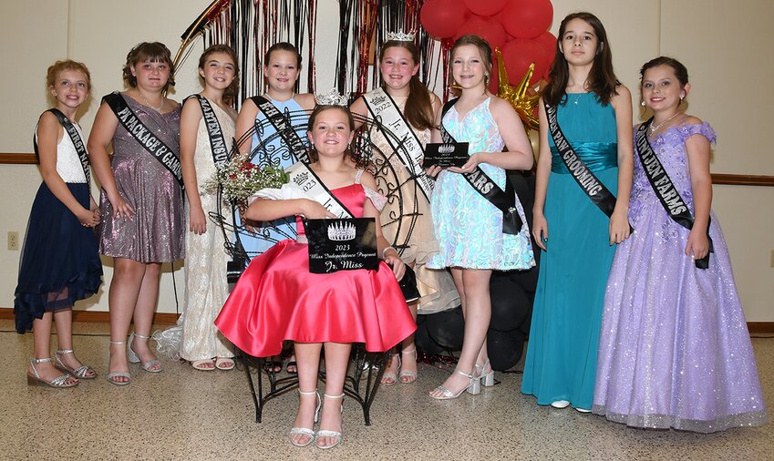 Paislee Krager, seated in front, was crowned 2023 Junior Miss Independence on Saturday evening, Sept. 16, as part of this year&rsquo;s Raymond Celebration at the Knights of Columbus Hall. Standing behind are Chloe Hoffman, Jocelynne Carron, Emery Meisner, Layla Wagahoff, retiring 2022 Junior Miss Independence Josephine Beeler, first runner-up Regan Morris, Bailey Hudgins and Jaylynne Carron.
