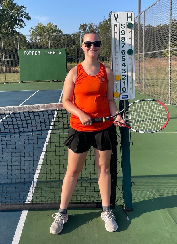 Senior Melissa Bell picked up a straight set win over Taylorville's Lydia Hopkins, 6-2, 6-2, during the Toppers' home match on Tuesday, Sept. 19.