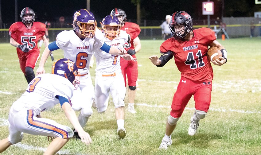 Nokomis' Brenton Lyons (#41) was homecoming king on Saturday, but on Friday, Sept. 22, the senior running back was more focused on dodging tackles. Lyons ran for 24 yards and a touchdown as the Redskins beat Tri-County 42-0 in Nokomis.