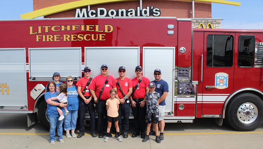 Pictured above, in front, from the left are Litchfield McDonald&rsquo;s Marketing Manager Sarah Gelsinger and Marley, Josie Pennock and Jase Pennock. In back are Litchfield McDonald&rsquo;s crew member Natalee Wendel and General Manager Mary Wallace and Litchfield firefighters Justin Kershaw, Chad Dooley, Chris Bierworth, Captain Curt Glover and Chief Adam Pennock.