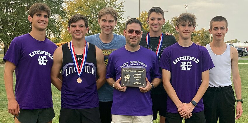 The Litchfield High School boys cross country finished third at the Carlinville Invitational on Oct. 3. From the left are Camden Quarton, Mitchell Floyd, Lucien Quarton, Coach Jeremy Palmer, Kenny Traylor, Alec Roach and Chris McGee. Not pictured is Braxton Kieffer