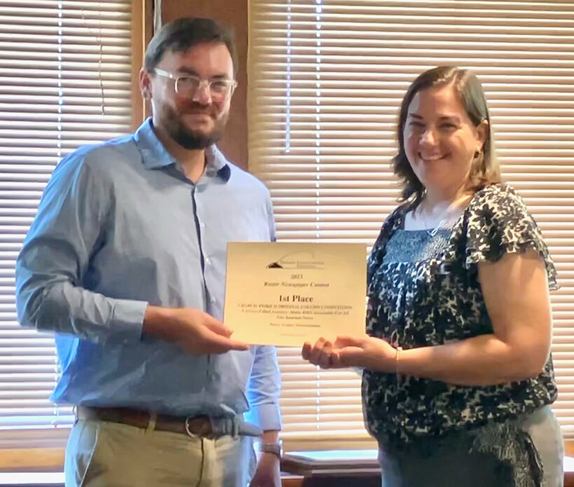 The Journal-News editor Mary (Galer) Herschelman, at right, accepts the newspaper&rsquo;s awards from Travis Lott, president of the Southern Illinois Editorial Association, at their annual meeting on Friday, Sept. 15, at Giant City Lodge in Makanda.
