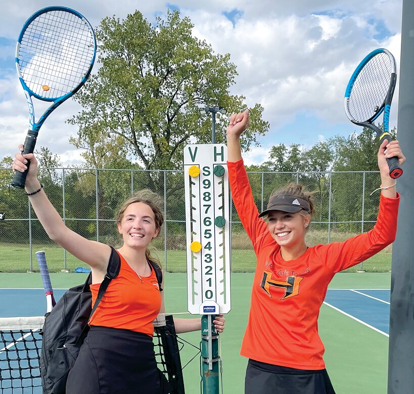 Hillsboro's Aly Leisure (left) and Ryder Hoover were all smiles after winning the doubles portion of the South Central Conference Tennis Tournament on Oct. 6, in Hillsboro.