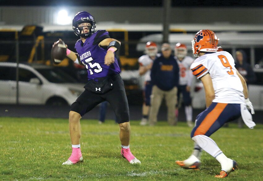 Litchfield quarterback Tate Dobrinich (#15) threw for 183 yards all three Litchfield touchdowns in the Purple Panthers' 20-15 win over Pana on Friday, Oct. 13. The win was Litchfield's fifth of the season, marking the first time the Panthers were playoff eligible since 2005.