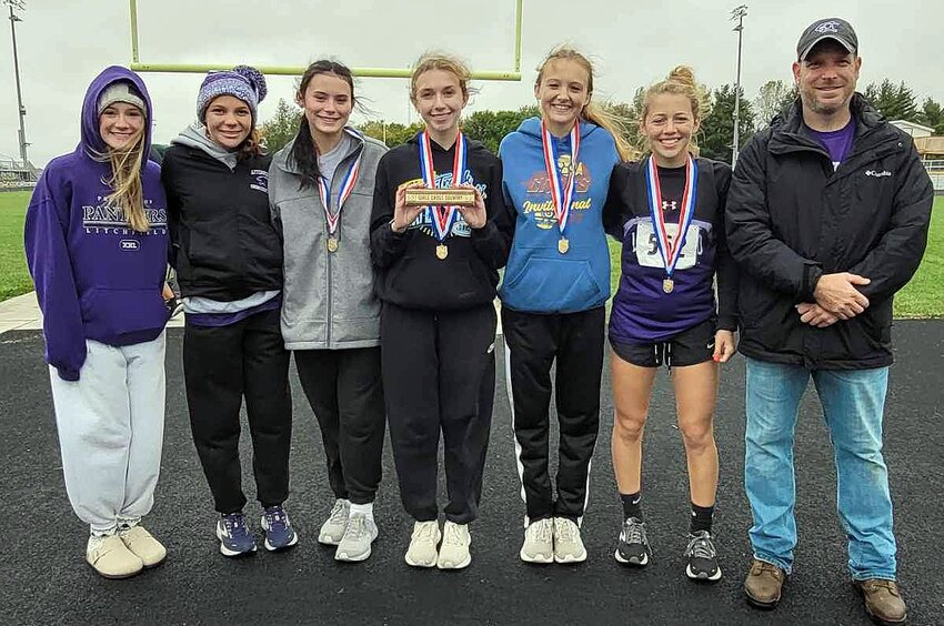 For the second straight year, the Litchfield girls cross country team are South Central Conference champions. From the left, are Caitlyn Travis, Alex Gasperson, Darby Braasch, Emma Diveley, Joelle Hughes, Rilynn Younker and Coach Jeremy Palmer.