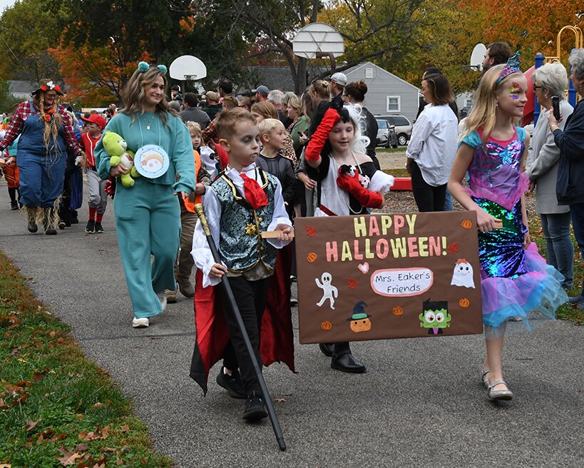 Pictured above, second graders in Mrs. Eaker&rsquo;s class participate in the annual Halloween parade around the Lincoln Trail.