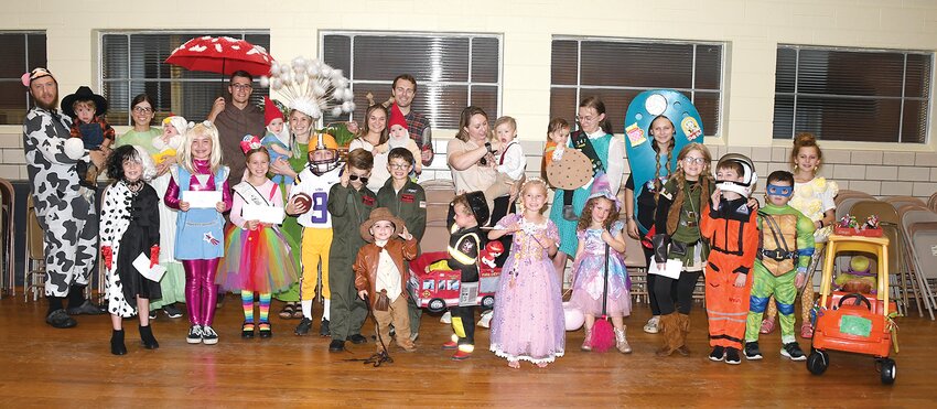 Winners of this year&rsquo;s Hillsboro Rotary Club Halloween Parade, in front, from the left are Haven Knight, Micah Holtschulte, 2023 Little Miss Montgomery County Fair Karsyn Jones, Ryker Holtschulte, Ellis Limbaugh, Chandler Limbaugh, Gianni Vitale, Braxton Rhodes, Nora Fuller, Rowan Reitz, Isabel McLaughlin, James McLaughlin and Talon Schmitt. In back are Peter Green with Elliott Green, Chelsey Green with Evelyn Green, Kurt Dixon with Margot Dixon (hidden), Emma Dixon with Calvin Dixon, Hannah Deming with Saul Deming, Cole Deming, Kendra Kirby with Benson Kirby, Alexandra Wright with Dorathea Wright, Ella Reynolds and Lauren Cullison.