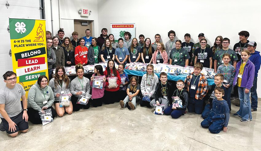 Pictured above, members of Christian, Jersey, Macoupin and Montgomery counties 4-H programs donated items for hygiene kits and packaged them prior to the 4-H Officer Training on Saturday, Oct. 21.
