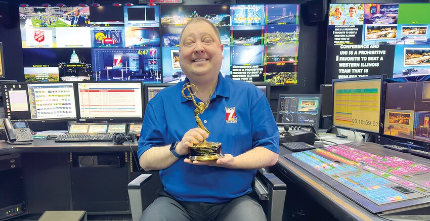 Former Hillsboro resident Jeff Sandlin with his news director Emmy Award at KWWL News 7 in Waterloo, IA.