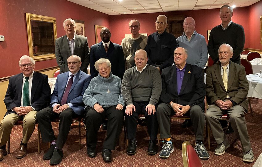 Members of the Veiled Non-Profit group, in front, from the left are Lonnie Bathurst, Nick Adam, Dorothy Mansholt, Mike Fleming, Ed Wernsing and Henry Eilers. In back are Roger Maulding, Steve Bryant, Dave Darte, Dr. Ross Billiter, Jerry Williams and Mark Stieren.
