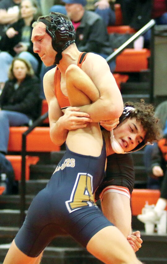 Hillsboro's Gaven Vollintine was in good position for most of his match against Althoff's Ryan Hogue, eventually getting the pin at the 4:54 mark of the 138-pound match. The victory was one of two for Vollintine on Friday, Dec. 1, as the Toppers defeated both Althoff and Carlyle on the night.