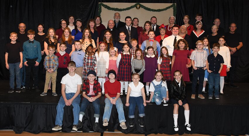 Pictured above, in front, from the left are Jackson Cunningham, Louden Reed, Graham Dyas, Robbie Hilt, Mila Reed and Kate Cunningham. In the second row are Jake Furness, Brookes Cherry, Nolan Dyas, Stella Eisentraut, Parker Ripley, Betsy Reed, Naomi Cherry, Rylee Fath, Morgan Sands, Abigayle Sturgeon, Millie Raison, Ryker Holtschulte and Ellis Limbaugh. In the third row are Harrison Tuetken, Skyler Sturgeon, Avery Maddaleno, Lexi Myers, Lydia Collins, Nova Raison, Addie Dyas, Sloan Tuetken, Wade Cherry, Landon Myers, Breeawna Reincke and Marisa Shipman. In the fourth row are Roger Fath, Tracy Churchwell, Mandy Myers, Sami Eisentraut, Joyce Fath, David Cunningham, C.J. Dyas, Ali McCammack, Melody Cunningham, Kathy Beckom, Sandy Leitheiser, Debby Williams and Glen Cherry. In back are Kaylie Ripley, Jynnafer&nbsp;Marin, Randy Leuschke, Rachel Sturgeon, Donald Sturgeon, Patty Holshouser, Janis Collins, Eli Howard and Mark Williams.  Not pictured are  cast members Abigail Gorsage, Cannan Gorsage, Elijah Gorsage, Violet Limbaugh, Micah Holtschulte, Makinley Furness, Brenda Hamm, Aria Mekala, Taryn Hutchins and Brenley Hutchins; sound and lights crew Robbie Shipman, Cary Eisentraut and Matt Sands and directors Lisa Shipman, Missy Sands, Amanda Cunningham, Stephanie Dyas and Megan Tuetken.