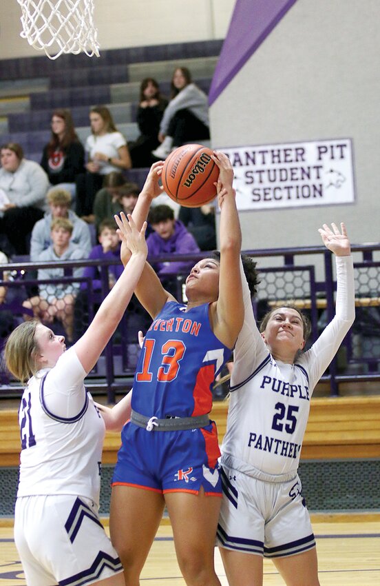 Litchfield&rsquo;s Madi Jenkins (left) and Daphney Hartel (right) battle for a rebound with Riverton&rsquo;s Brandy Petit during the Purple Panthers&rsquo; home game on December 4. Despite eight points from Hartel, Riverton managed to sneak away with a 29-26 victory.