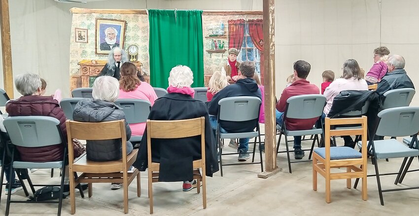 Nearly two dozen people attended the free show in the library basement, joining old Scrooge, bumbling Bob Cratchit, Tiny Tim, old Jacob Marley and the ghosts of Christmas Past, Present and Future, while discovering a special message this Christmas season.