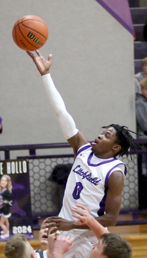Litchfield's Keenan Powell (#0) scored 22 points in the Panthers' 65-39 victory over Lincolnwood at the T. Todt Shootout on Saturday, Dec. 9, in Litchfield.