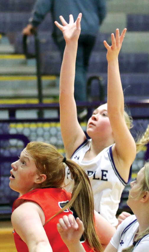 Litchfield's Chloe Law puts up a shot over Lincolnwood's Lilly Terneus during the T. Todt Shootout on Saturday, Dec. 9, in Litchfield. Law scored 13 points to lead the Lady Panthers to their second win of the season, 29-22 over the Lancers..