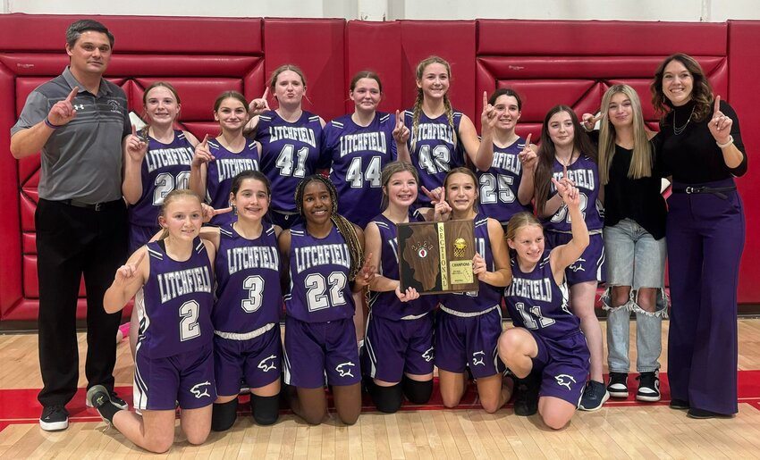 The Litchfield Middle School girls basketball program had made it to the IESA State Finals 10 times going into this season, but not since 2010. On Wednesday, Dec. 6, the eighth grade Lady Panther Cubs ended that drought with a 26-18 win over Auburn at the Vandalia Sectional. In front, from the left are Emma Estell, Charlotte Reyes, Jada Carroll, Lynzie Reid, Aida Melchert and Kayleigh Morgan. In the back are Head Coach Drew Logan, Samantha Rieke, Kinley Hemken, Allison Belusko, Jennah Longwell, McKenna Harmon, Emma Weidner, Sarah Rieke, Manager Halle Rogers and Assistant Coach Jennifer Flemming. Just making the tournament wasn&rsquo;t enough for the Panther Cubs, though, as they will play for third place on Thursday, Dec. 14, at Germantown Hills Middle School.
