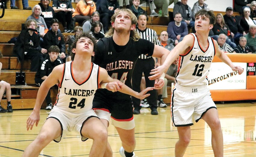 Lincolnwood&rsquo;s Brayden Morris (#24) and Tucker Armentrout (#12) work together to keep Gillespie&rsquo;s 6&rsquo;5&rdquo; 235-pound forward Bryce Hohnsbehn off the boards during a free throw attempt in the second half of the Lancers&rsquo; home opener on Tuesday, Dec. 12. The hosts held Gillespie to single digits in each of the first three quarters and hit 10 threes on the night to beat the Miners 59-41.