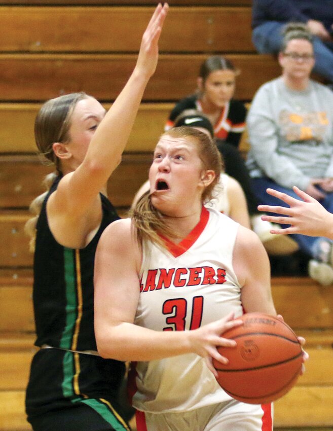 Southwestern's Vivian Zurheide (left) guard's Lincolnwood's Lilly Terneus during the second half of the Lancers' 39-26 loss to the Piasa Birds on Saturday, Dec. 16. After a slow start, Lincolnwood finished the game with some momentum as they outscored the Piasa Birds 20-16 in the final two quarters.