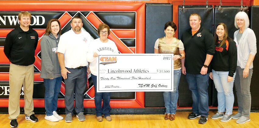 In its 10-year history, the TEAM Playday has raised more than $250,000 for Lincolnwood athletics, with the 2023 event raising a record $31,500. Proceeds from this year&rsquo;s golf tournament were presented between the Lancers&rsquo; boys and girls basketball games on Saturday, Dec. 16. From the left are boys basketball coach Matt Millburg, volleyball coach Kimberly Denney, girls basketball coach Justin Millburg, Patty Clarke and Dana Pitchford from the TEAM Playday Committee, Lincolnwood Athletic Director Josh Stone, assistant volleyball coach Lesley Cowdrey and cheerleading coach Bev Lipe.