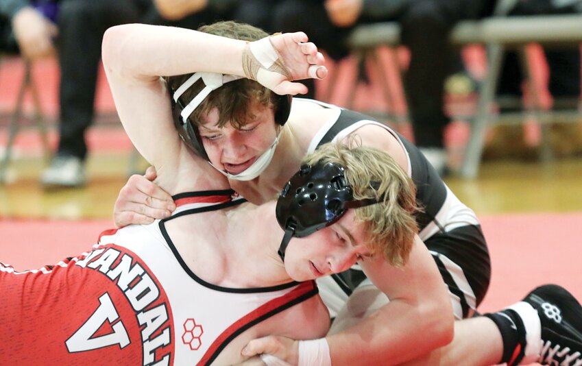 Litchfield's Braxton Kieffer picked up two victories in the Panthers' triangular meet in Vandalia on Thursday, Jan. 11, including one against the Vandals' Keagan Turner (above). In addition to Kieffer, Vincent Moore and Jayden Ellinger also got two wins on the night for LHS.