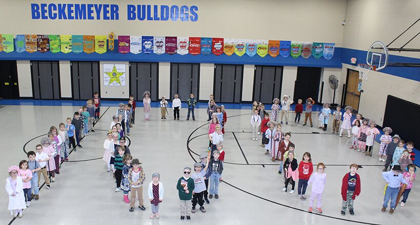 Kindergarten students and staff at Beckemeyer Elementary School celebrated 100 days of school on Friday, Jan, 26. Pictured above, the excited students and staff dance along to songs with the theme of counting to the number 100.
