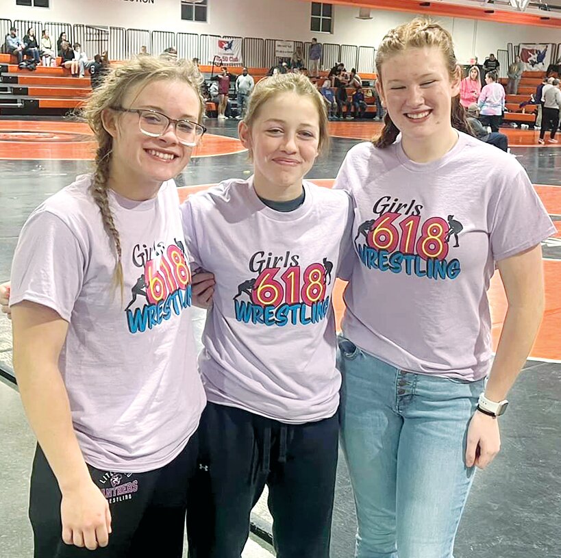 In preparation for the postseason, two Litchfield-Mt. Olive wrestlers were among the 67 competitors at the inaugural 618 Girls Wrestling Scramble on Tuesday, Jan. 16, in Edwardsville.From the left are Charlie Bono, who finished fourth at 130 pounds; Rilynn Younker, who finished first at 110 pounds; and team manager Janet Mazza.
