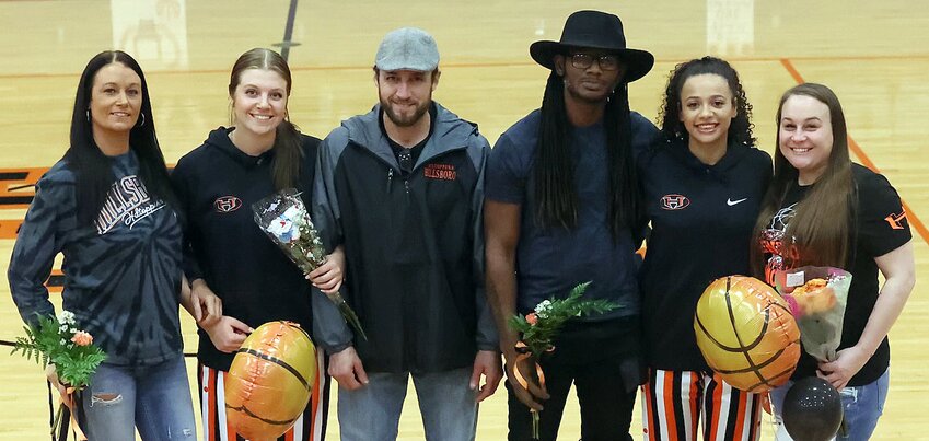 It was senior night for the Hillsboro girls basketball team as the Lady Hiltoppers took time to honor Sophia Blankenship and Aubrey Evans, on Thursday, Feb. 8. Pictured above, from the left, are Blankenship, with parents Cody Hodges and Gabe Blankenship, and Evans, with parents Katie McDonald and Reginald Evans.