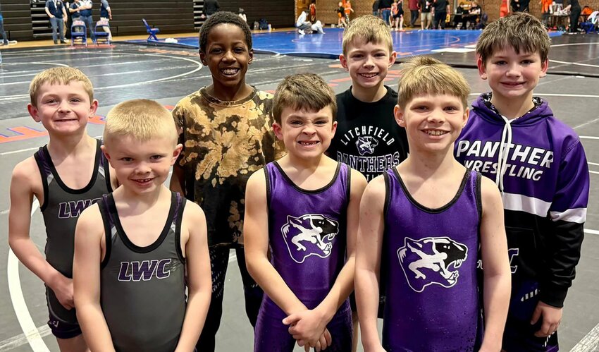 Seven wrestlers from the Litchfield Wrestling Club competed in the IKWF Regional on Feb. 24, in Litchfield. In front, from the left are Lincoln Morris, Lincoln Rogers and Braxton Young. In the back are Owen Pryor, Omarr Robinson, Grayson Short and Kyson Hemken.