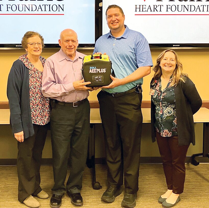 Pictured above, from the left are Theresa Lang and Deacon Louis Lang of Calvary Baptist Church in Hillsboro, Mike McGraw of McGraw Enterprises and Brandy Grove, manager of philanthropy for Prairie Heart Foundation.