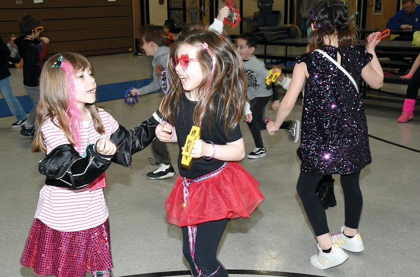 Pictured above, Laekyn Hemken, at left, and Morgan Sands dance to some of their favorite songs.