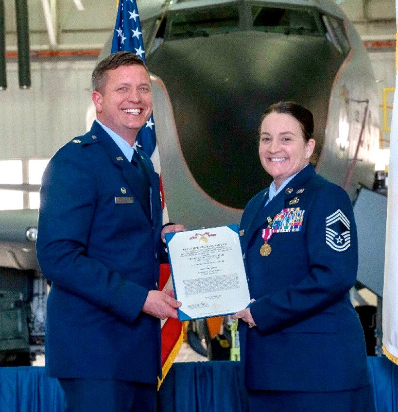 On Sunday, March 3, Chief Master Sgt. Amanda G. Stewart, of Nokomis was honored for her 34 years of military service. Pictured above, Stewart receives her medal from Commander Lt. Col. Brad Kahrhoff.