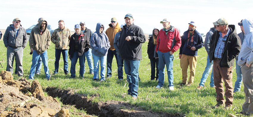 Members of the Montgomery County Farm Bureau toured Reynolds Farms in Nokomis on Wednesday morning, March 20. Pictured above, Kris Reynolds tells onlookers about cover crop practices and how he utilizes them on his farm.