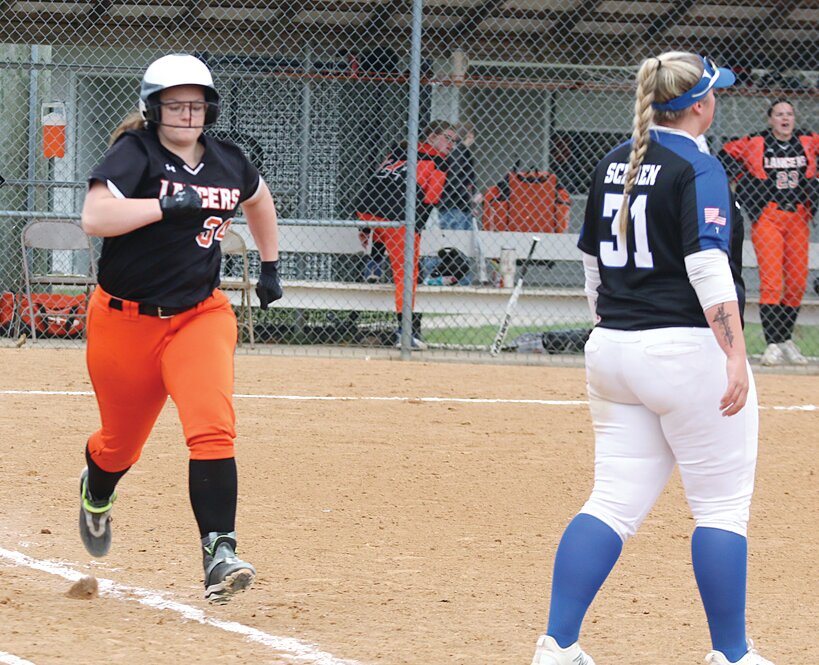 Lincolnwood's Jenna Matli hustles to first during the Lancers' home game with Auburn on Friday, April 5. While the Lancers lost that game 13-3, with all 13 runs coming from the fourth inning on, Matli was a bright spot with two hits and a run scored. She continued her hot streak the following day with two more hits in the Lancers' 11-1 win over Greenfield-Northwestern.