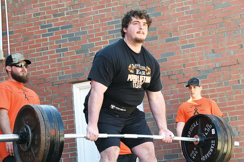 Ray Wille of the Raise the Bar Powerlifting Team dead lifts 500 pounds at the inaugural Raise the Bar Against Cancer Powerlifting challenge, held Saturday, April 13, on the Lincoln Plaza. Nearly 25 power lifters competed that day, raising $500 for the Montgomery County Cancer Association.