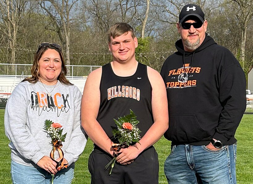 Senior Cole Lenczycki, pictured with his parents Jenny and Jason Lenczycki, was honored during the Hillsboro track senior night festivities on Tuesday, April 9, at Sawyer Field.
