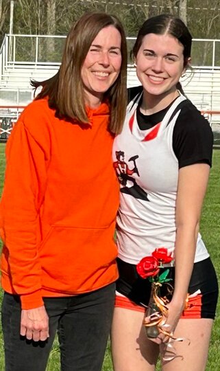 Senior Hanna Hughes, pictured with her mom, Audra Moore, was honored during Hillsboro track senior night festivities as Sawyer Field on Tuesday, April 9.