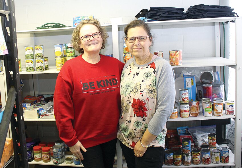 Five Loaves Food Pantry Director Linda Williams, left and Heidi Miles, right, are hoping to make a difference in Fillmore and surrounding communities with their efforts in providing homeless students, families and all in need with the basic supplies they need to survive.