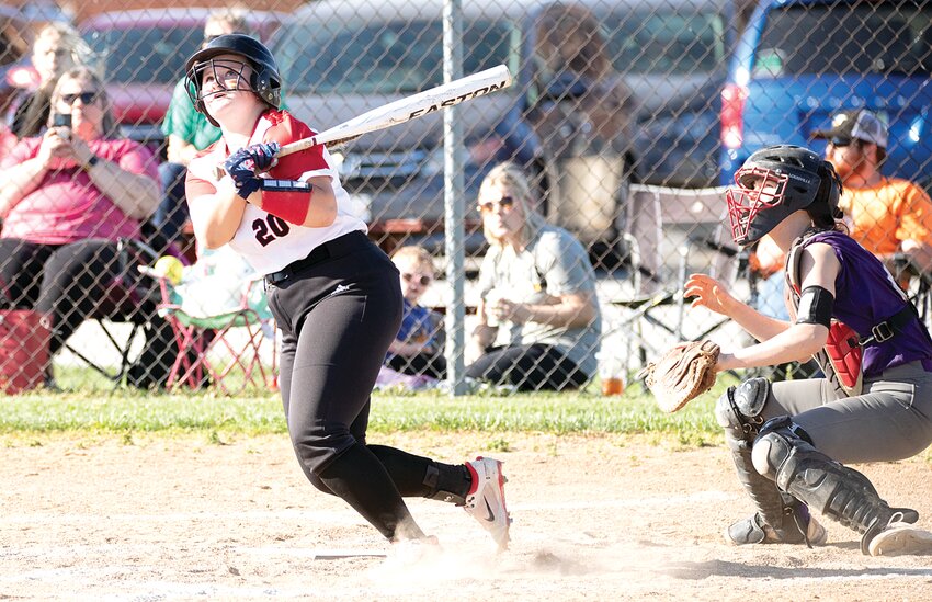 Nokomis' Ella Huelson tracks her hit toward left field during the Lady Redskins' home game on Wednesday, April 17, against Litchfield. The Redskins scored first, but Litchfield came away with a 5-2 victory, with Litchfield catcher Bella Roach (pictured above) driving in one run and scoring another for the Panthers.