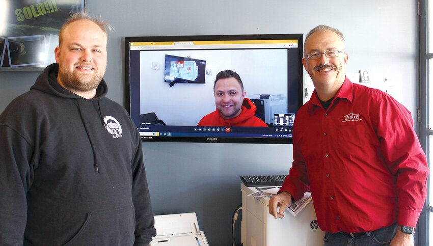 The Cisler Real Estate office located at 226 N. State St. in Litchfield went virtual in 2020 due to the COVID pandemic. The adaptation has proved successful for the agency and its employees. Pictured above, from the left, are agent Matthew Cisler, Jacob Hussman appearing virtually from the Staunton office and Dave Cisler.