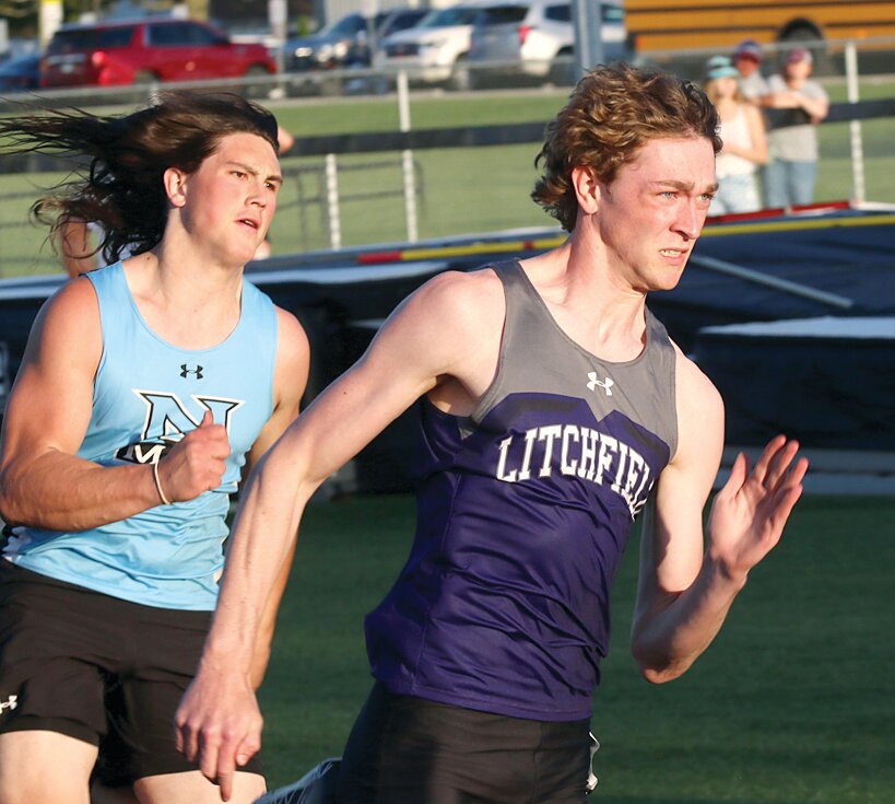 Litchfield senior Zach Leitschuh rounds the turn near the start of the 200 meter dash at the South Central Conference Championships on Tuesday, April 30, in Virden. Leitschuh was also a part of the Panthers 4x200 meter relay team that won earlier in the day, one of five SCC championships for Litchfield, who won their first conference title in boys track since 2012.