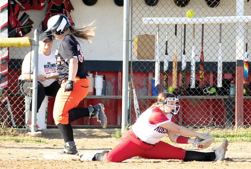Despite Nokomis first baseman Jayde Gonet going all out for the catch, Lincolnwood's Jenna Matli managed to beat out the throw for an infield single during the county clash on Tuesday, April 30. The play at first was one of several impressive picks Gonet had during the game, in addition to picking up a hit and an RBI in the Lady Redskins' 8-3 win over the Lancers.
