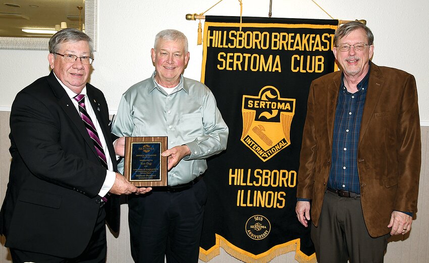 Mark Osborn, at left, presents this year&rsquo;s Hillsboro Sertoma Club Service to Mankind Award to Ron Duff, center, on Wednesday evening, May 1. Also pictured is guest speaker Matt Ferguson, pastor of the Hillsboro Presbyterian Church.