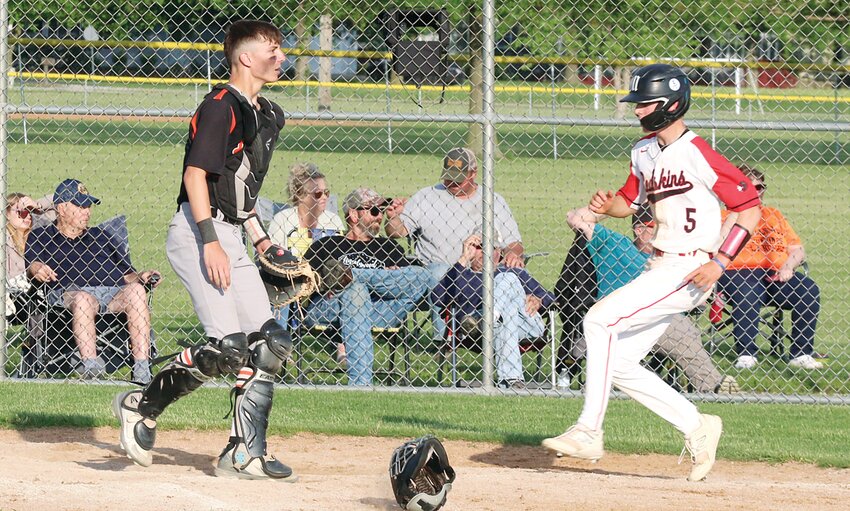 Lincolnwood catcher Tucker Armentrout couldn't do much else but wait as Kannon Jonas scored the tying run for Nokomis in the bottom of the seventh inning of the MSM Conference game between the two rivals on May 3. Ian Keller was not far behind Jonas as the Redskins plated two runs in the inning to escape with a 6-5 win.